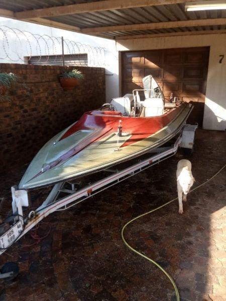 ski boat with 115hp Suzuki motor