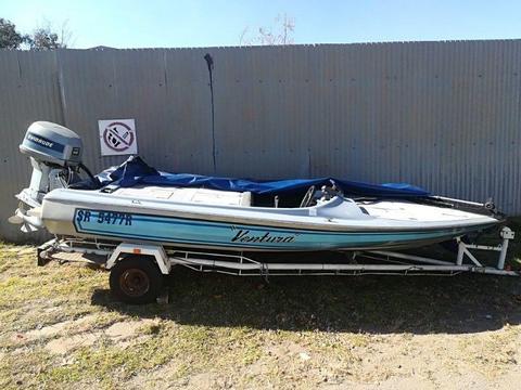 Bass boat with 115 Evenrude and trawling motor