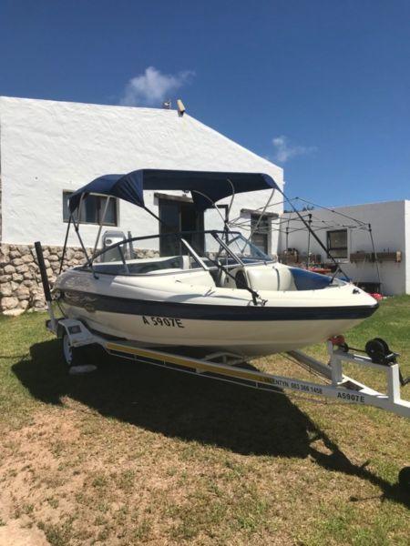Sensation ski boat with 125 Mariner