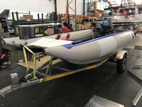 Aquarius racing boat on galvanised trailer (no motor included)
