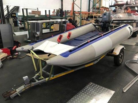Racing boat with trailer (no motor)