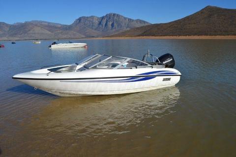 Speedboat with Campsite and Caravan