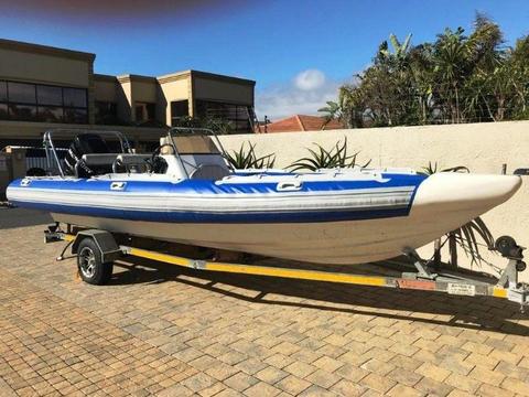 7M Falcon with 200HP Mercury Optimax