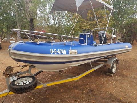 5.2m Semi rigid Wildcat 90hp Mercury trim/tilt