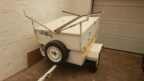 Trailer with licenced and mountings for small boat on the roof