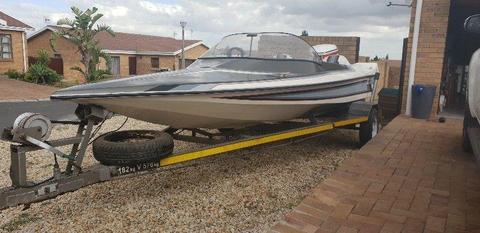 Dominator speedboat with 90 Evinrude