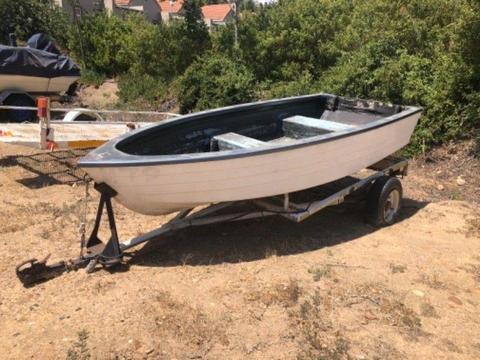 Fiberglass Boat with 10hp Yamaha engine and comes with a trailer