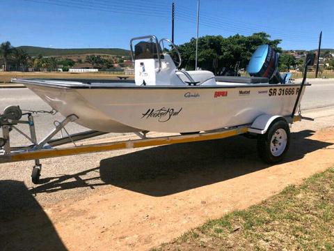 Crestrider cathedral hull boat with motor