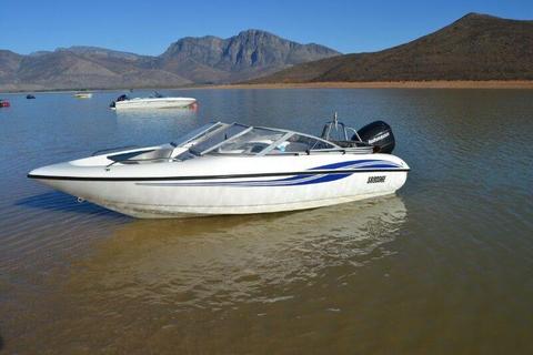 Speedboat with Campsite and Caravan