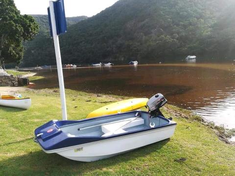 Spider 1 boat with 5HP Mariner outboard 