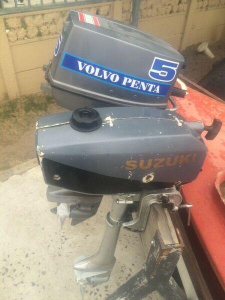 3 small outboard motors 